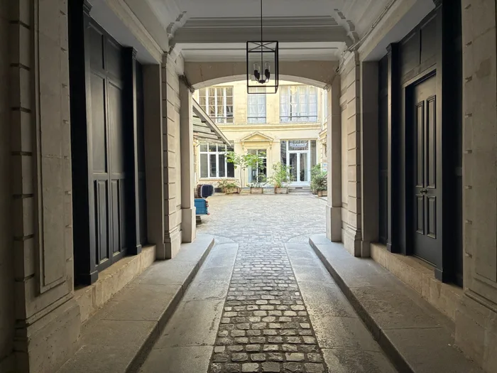 The 19th-century carriage entrance and courtyard